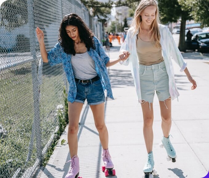 girls skating outdoors